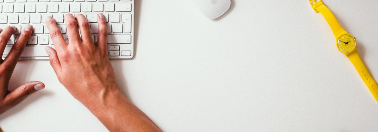 Person typing on a computer