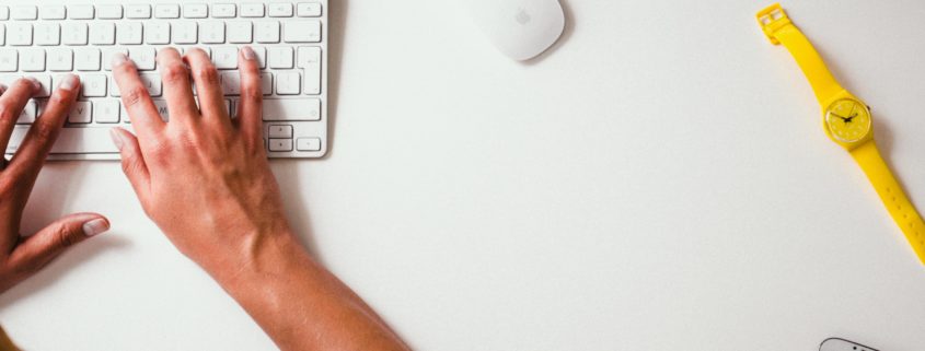 Person typing on a computer